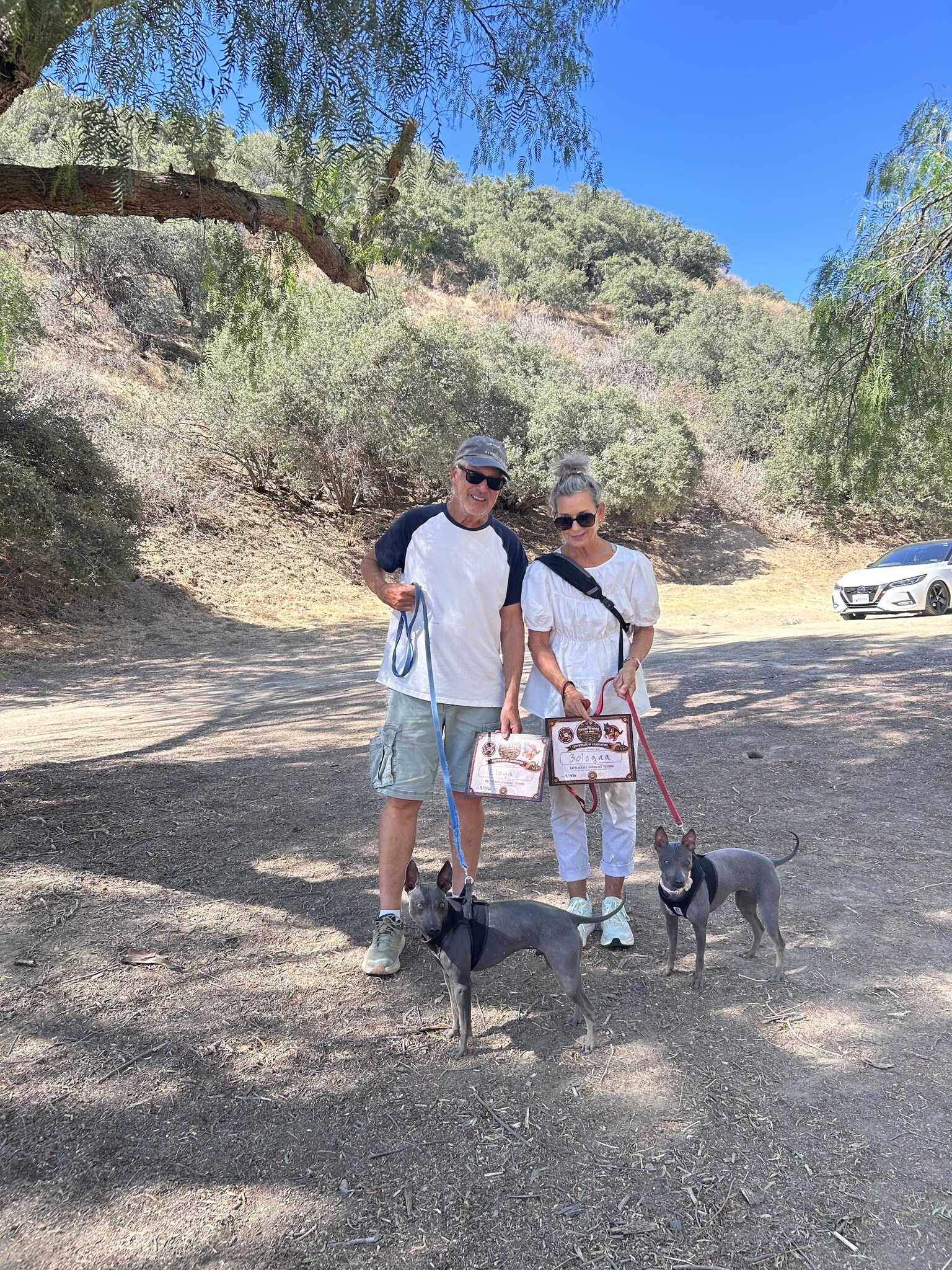 Lloyd and Bologna's graduation day after rattlesnake avoidance training