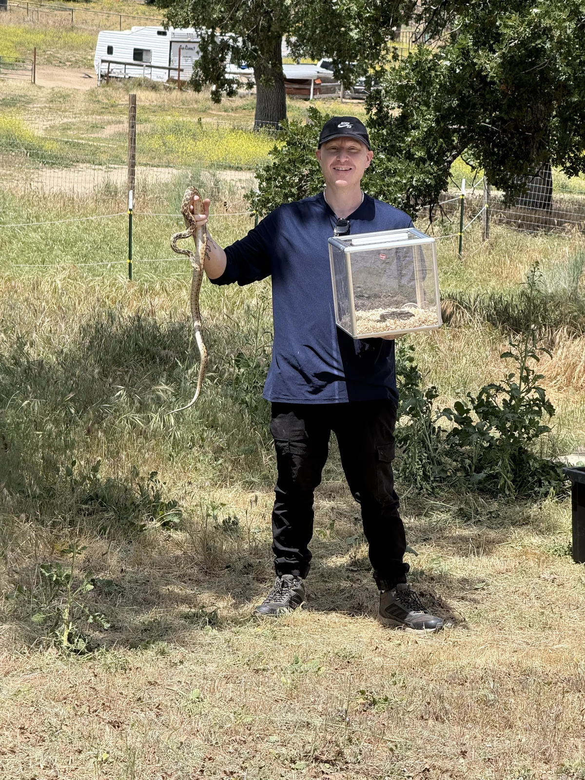 Scott Quashen handling a snake at The Snake School