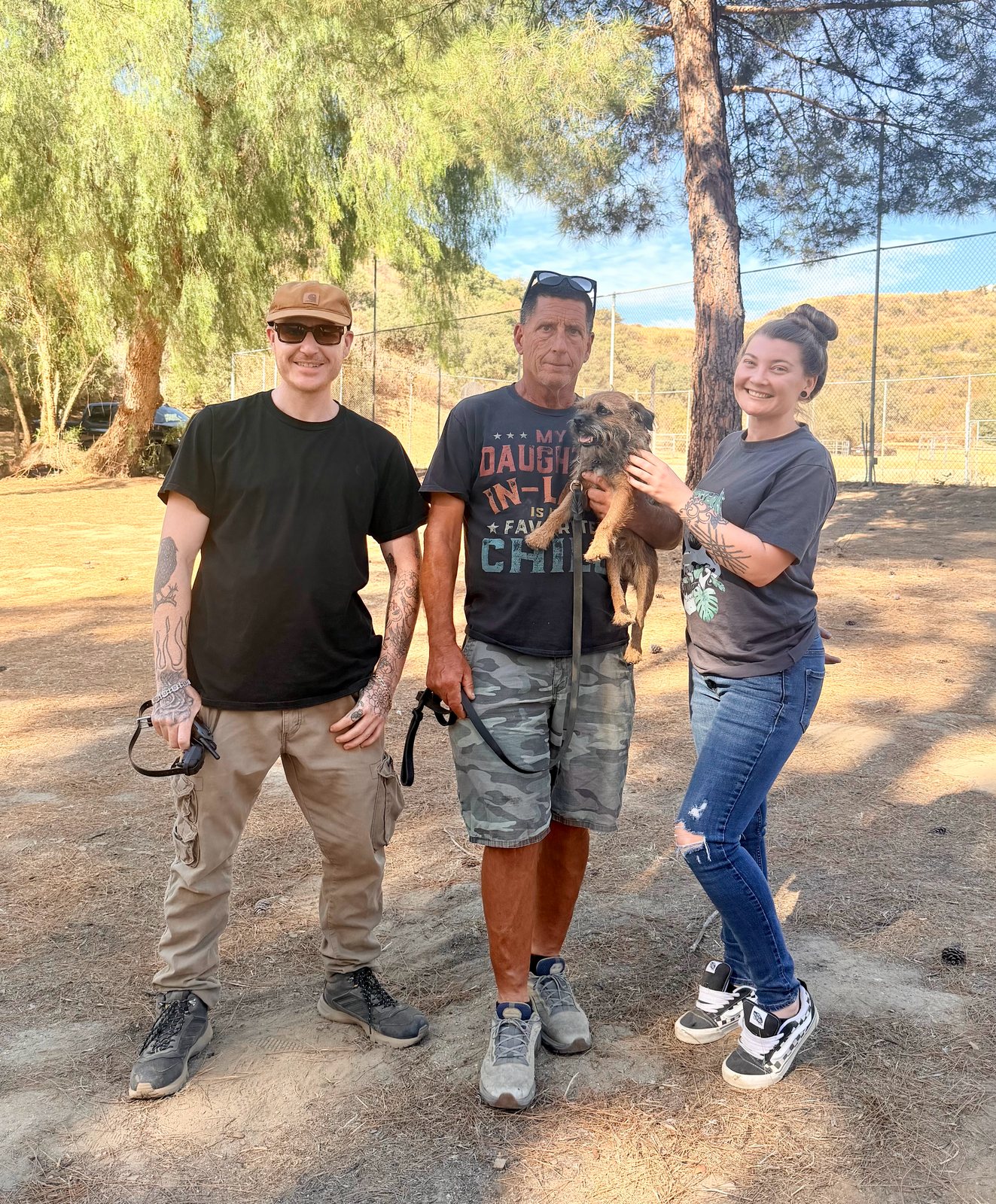 Snake School clients with their dog after graduating rattlesnake avoidance training